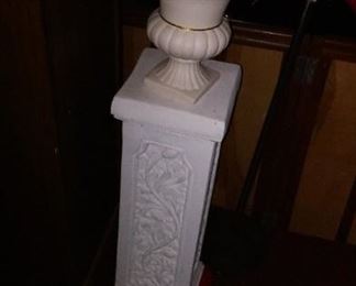 One of 2 similar white pedestals.