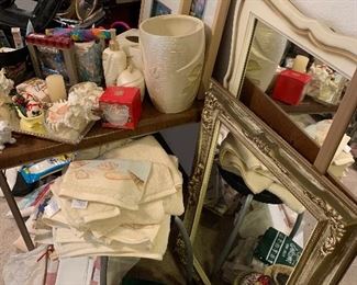A large collection of home decor, linens, stationary, framed mirrors and other. 