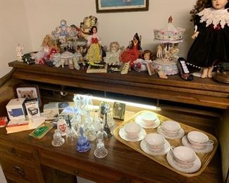 Roll top desk, tea cups, collectible bells, dolls, office supplies and more