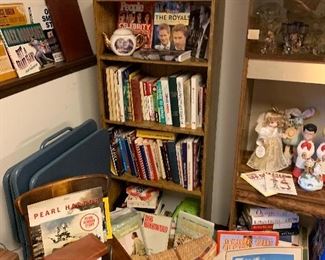 Dolls, royal family collectibles, book cases, and albums. 