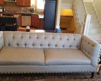 Beautiful button back nail trimmed sofa. Like new.