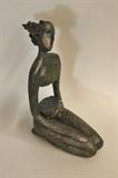 Modern Sculpture of a Woman Kneeling