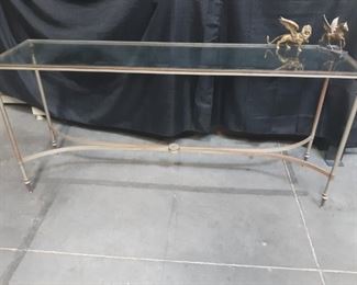 Sofa table and brass decor