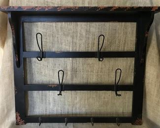 Rustic wood wall decor with hooks