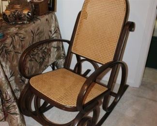 Dark wood Thonet style cane back rocking chair