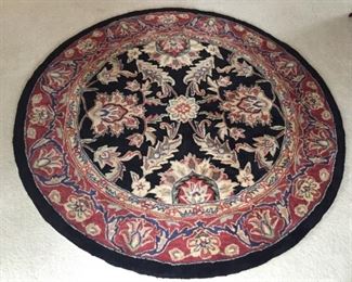Round oriental rug.