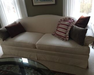 Sofa with throw pillows.