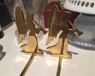 Brass angel stocking holders.