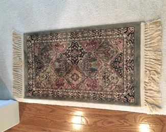 Small oriental rug.