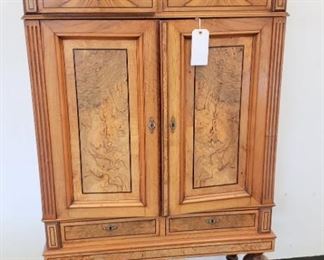 Burled wood dining room cabinet