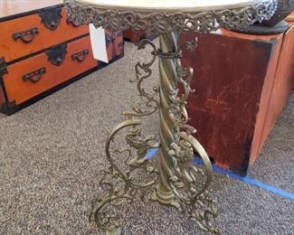 Ornate bronze and onyx table