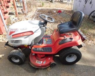 2012 Huskee 42 inch and 18.5 Hp riding lawnmower.