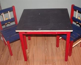 Children's chalk table and chairs.