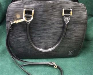  Authentic “Louis Vuitton” Black Leather Epi Pint Neuf MI I020 Purse

Auction Estimate $500-$1000 – Located Glassware 