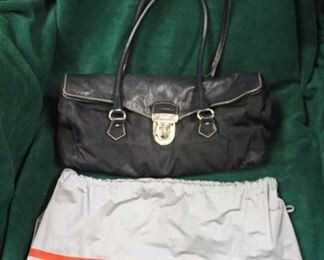  Authentic “Prada” Black Leather and Canvas Purse with Dust Bag

Auction Estimate $200-$600 – Located Glassware 