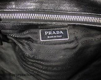 Authentic “Prada” Black Leather and Canvas Purse with Dust Bag
Auction Estimate $200-$600 – Located Glassware