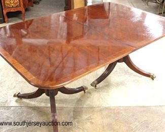  BEAUTIFUL Mahogany Double Pedestal Banded and Inlaid Dining Room Table with 12 SOLID Mahogany Carved Chippendale Style Dining Room Chairs

Auction Estimate $1000-$2000 – Located Inside 