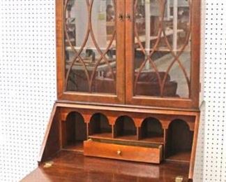  Burl Mahogany “Baker Furniture” Bracket Foot Secretary Desk with Bookcase Top

Auction Estimate $300-$600 – Located Inside 