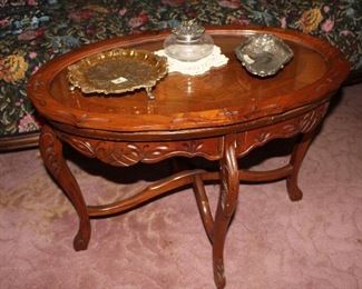 carved tea table; glass top tray lifts off