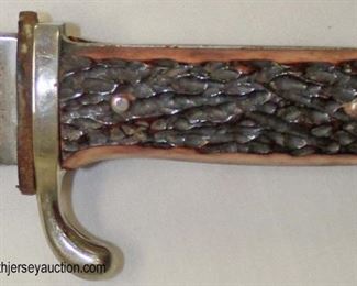 Lot 15: Post war HJ style youth dagger with some modifications with a scabbard Solingen