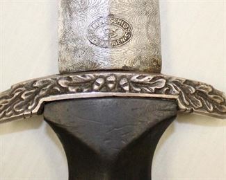 Lot 17: WWII German SS 1936 presentation dagger with leather cover scabbard makers mark P.D. Luneschloss, Solingen, damascus blade – right markings – extremely rare – authenticity unverified – looks good – must inspect