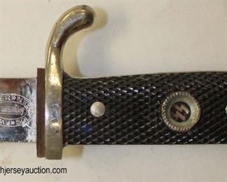 Lot 19: German WWII dress bayonet by EF Holler (with applied SS emblem ?) with a frog