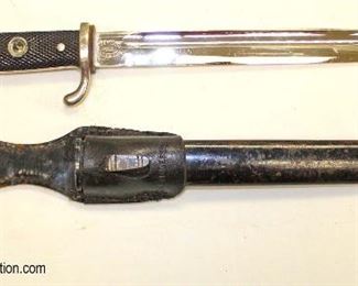 Lot 19: German WWII dress bayonet by EF Holler (with applied SS emblem ?) with a frog