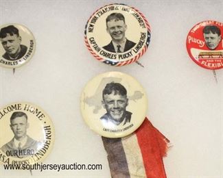 Lot 63: Capt. Chas. A. Lindbergh pins in display case believed to be to period (lot of 5)