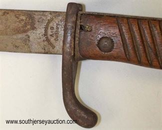Lot 72: DWM Butcher Blade Bayonet for a Mauser Deutsche Machinenfabrik A-G Duisburg with leather and steel scabbard