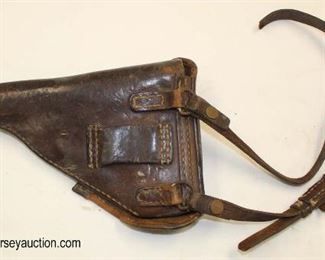Lot 95: WWII Leather Gun Holster with magazine clip