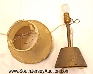 Lot 132: Hitler Yacht Grille Brass Felt Bottom Lamp, Slip Shade, Newer Cord approximately 12” high 6” wide (believed to have been on one of Hitler's boats with news articles)