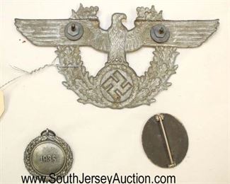 Lot 140: 3pc lot: German Badges including Luftscutze Service Badge, Wound Badge and German Police Car Badge