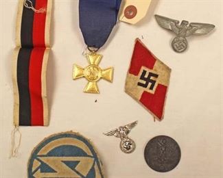 Lot 143: 7pc lot: German Badges, Pins and Medals including 25 Year Long Service Army Medal, German Visor Cap Eagle, Day Badge 1937, Political Cap Badge, Badge Ribbon, SA Patch, Hitler Youth Patch
