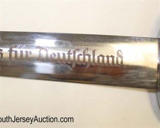 Lot 146: WWII German SA Dagger with repainted Scabbard Made by E. Pack and Son Marked NRH on Hand Guard
