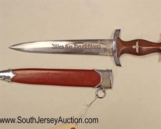 Lot 146: WWII German SA Dagger with repainted Scabbard Made by E. Pack and Son Marked NRH on Hand Guard