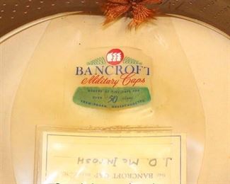 Lot 149: Lot of Personal Effects of Veteran of WWII, Korea, and Vietnam John D. McIntosh including WWII USN Officers Visor Cap, Photo of John D. McIntosh, 2 Military Photos, Front Band, and 2 Extra Hat Covers in the Original Shipping Box