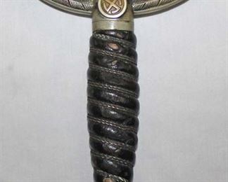 Lot 151: WWII German Officer's Sword in original found condition with original scabbard