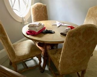 Bausman & Co round dining table and four chairs