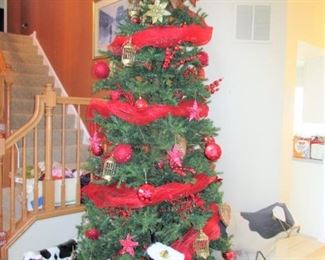 The beautiful tall tree is for sale along with all the decorations and what is under the tree, each priced individually