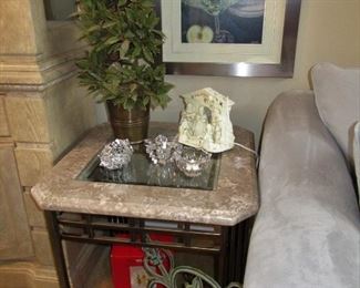 glass, marble, and metal coffee table and has 2 matching lamp tables, quite an impressive modern set. 