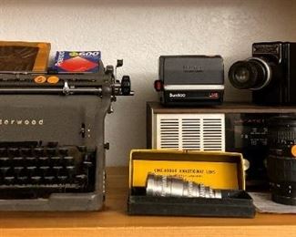 Underwood typewriter
Cine-kodak lens
Quantaray lens
Polaroid film
Filmo autoloader
Kidaslide projector