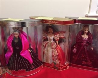 Holiday Barbies from '95, '96, '97, '98, 2002 and Millennium.