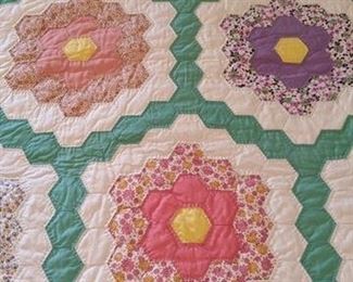 close up Grandmother's flower garden quilt