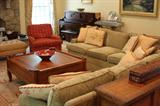 Pair sofas, pair club chairs, ottoman, Baker tables