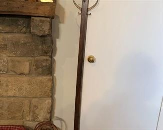 #51		Wood Coat Rack  27" Tall w/4 Brass Hooks	 $35.00 
