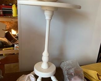 #64		white end table w pedestal 14x22	 $20.00 
