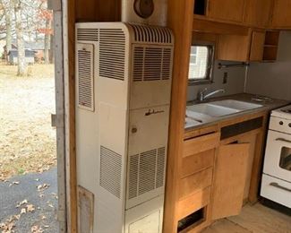 #101	outside	1954 Spartan as is travel trailer with 1 bedroom, bath, kitchen, ac and heat	 $6,500.00 
