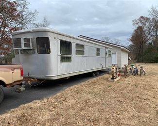 #101	outside	1954 Spartan as is travel trailer with 1 bedroom, bath, kitchen, ac and heat	 $6,500.00 
