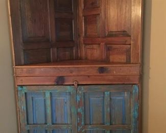 unique solid wood corner cabinet with Mexican barn-door doors