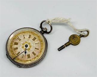 Victorian Era Key Wind, Key Set Pocket watch with real solid yellow gold flakes on the front of the dial. Watch will wind and set but will not run. Needs some degree of repair. Price $150.00